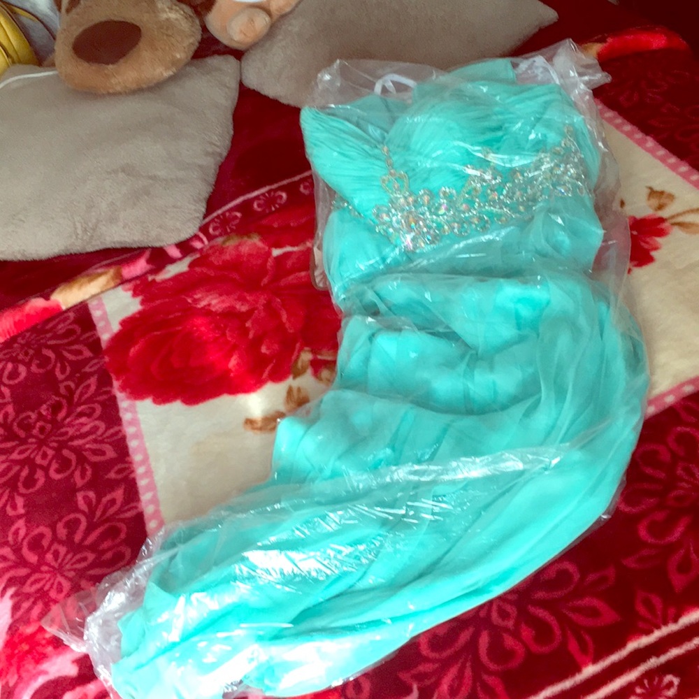 Long mintyish dress with diamonds on the waist